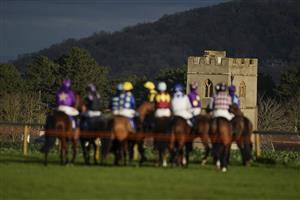 TAUNTON, ENGLAND - DECEMBER 10: Runners in The Stables Business Park Novices' Handicap Hurdle circle at the start at Taunton Racecourse on December 10, 2020 in Taunton, England. Owners and a limited number of the public are allowed to attend the meeting due to the Coronavirus pandemic. (Photo by Alan Crowhurst/Getty Images)