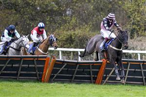 TAUNTON, ENGLAND - DECEMBER 10: Nathan Brennan riding Mount Windsor clear the last to win The Dave Criddle Travel - Let's Fly Again Handicap Hurdle at Taunton Racecourse on December 10, 2020 in Taunton, England. Owners and a limited number of the public are allowed to attend the meeting due to the Coronavirus pandemic. (Photo by Alan Crowhurst/Getty Images)