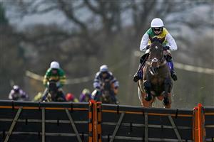 TAUNTON, ENGLAND - DECEMBER 10: Harry Cobden riding Atholl Street clear the last to win The Racing To School Novices' Hurdle (GBB Race) (Div 1) at Taunton Racecourse on December 10, 2020 in Taunton, England. Owners and a limited number of the public are allowed to attend the meeting due to the Coronavirus pandemic. (Photo by Alan Crowhurst/Getty Images)