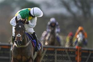 TAUNTON, ENGLAND - DECEMBER 10: Harry Cobden riding Atholl Street clear the last to win The Racing To School Novices' Hurdle (GBB Race) (Div 1) at Taunton Racecourse on December 10, 2020 in Taunton, England. Owners and a limited number of the public are allowed to attend the meeting due to the Coronavirus pandemic. (Photo by Alan Crowhurst/Getty Images)