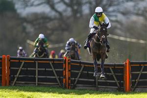 TAUNTON, ENGLAND - DECEMBER 10: Harry Cobden riding Atholl Street clear the last to win The Racing To School Novices' Hurdle (GBB Race) (Div 1) at Taunton Racecourse on December 10, 2020 in Taunton, England. Owners and a limited number of the public are allowed to attend the meeting due to the Coronavirus pandemic. (Photo by Alan Crowhurst/Getty Images)