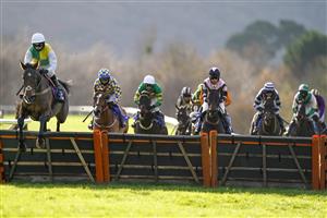 TAUNTON, ENGLAND - DECEMBER 10: Harry Cobden riding Atholl Street (L) on their way to winning The Racing To School Novices' Hurdle (GBB Race) (Div 1) at Taunton Racecourse on December 10, 2020 in Taunton, England. Owners and a limited number of the public are allowed to attend the meeting due to the Coronavirus pandemic. (Photo by Alan Crowhurst/Getty Images)