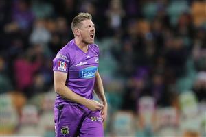 HOBART, AUSTRALIA - DECEMBER 10: James Faulkner of the Hurricanes celebrates with team mates after taking the wicket of Josh Philippe of the Sixers during the Big Bash League match between the Hobart Hurricanes and Sydney Sixers at Blundstone Arena, on December 10, 2020, in Hobart, Australia. (Photo by Matt King/Getty Images)