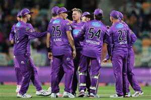 HOBART, AUSTRALIA - DECEMBER 10: James Faulkner of the Hurricanes celebrates with team mates after taking the wicket of Josh Philippe of the Sixers during the Big Bash League match between the Hobart Hurricanes and Sydney Sixers at Blundstone Arena, on December 10, 2020, in Hobart, Australia. (Photo by Matt King/Getty Images)
