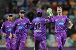 HOBART, AUSTRALIA - DECEMBER 10: Riley Meredith of the Hurricanes celebrates with team mates after taking the wicket of Jack Edwards of the Sixers during the Big Bash League match between the Hobart Hurricanes and Sydney Sixers at Blundstone Arena, on December 10, 2020, in Hobart, Australia. (Photo by Matt King/Getty Images)