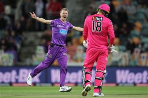 HOBART, AUSTRALIA - DECEMBER 10: Riley Meredith of the Hurricanes celebrates taking the wicket of Jack Edwards of the Sixers during the Big Bash League match between the Hobart Hurricanes and Sydney Sixers at Blundstone Arena, on December 10, 2020, in Hobart, Australia. (Photo by Matt King/Getty Images)