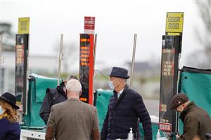 CHELTENHAM, ENGLAND - DECEMBER 11: Socially distanced bookmakers at Cheltenham Racecourse on December 11, 2020 in Cheltenham, England. Owners and a limited number of the public are allowed to attend the meeting due to the Coronavirus pandemic. (Photo by Alan Crowhurst/Getty Images)