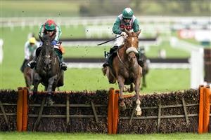CHELTENHAM, ENGLAND - DECEMBER 11: Tom Scudamore riding Make Me A Believer (L) clear the last to win The British EBF 'National Hunt' Novices' Hurdle from Sam Twiston-Davies and Any News (R) at Cheltenham Racecourse on December 11, 2020 in Cheltenham, England. Owners and a limited number of the public are allowed to attend the meeting due to the Coronavirus pandemic. (Photo by Alan Crowhurst/Getty Images)