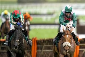 CHELTENHAM, ENGLAND - DECEMBER 11: Tom Scudamore riding Make Me A Believer (L) clear the last to win The British EBF 'National Hunt' Novices' Hurdle from Sam Twiston-Davies and Any News (R) at Cheltenham Racecourse on December 11, 2020 in Cheltenham, England. Owners and a limited number of the public are allowed to attend the meeting due to the Coronavirus pandemic. (Photo by Alan Crowhurst/Getty Images)