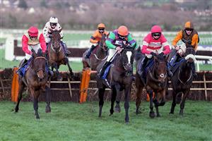 CHELTENHAM, ENGLAND - DECEMBER 12: Bryony Frost riding The White Mouse (C, orange cap) clear the last to win The Close Brothers Mares' Handicap Hurdle at Cheltenham Racecourse on December 12, 2020 in Cheltenham, England. Owners and a limited number of the public are allowed to attend the meeting due to the Coronavirus pandemic. (Photo by Alan Crowhurst/Getty Images)