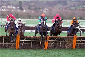 CHELTENHAM, ENGLAND - DECEMBER 12: Bryony Frost riding The White Mouse (C, orange cap) clear the last to win The Close Brothers Mares' Handicap Hurdle at Cheltenham Racecourse on December 12, 2020 in Cheltenham, England. Owners and a limited number of the public are allowed to attend the meeting due to the Coronavirus pandemic. (Photo by Alan Crowhurst/Getty Images)