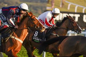 CHELTENHAM, ENGLAND - DECEMBER 12: Jamie Moore riding Goshen (R) during The Unibet International Hurdle at Cheltenham Racecourse on December 12, 2020 in Cheltenham, England. Owners and a limited number of the public are allowed to attend the meeting due to the Coronavirus pandemic. (Photo by Alan Crowhurst/Getty Images)