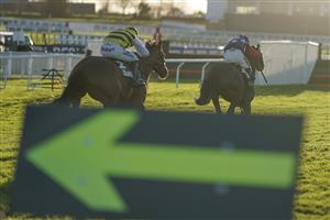 CHELTENHAM, ENGLAND - DECEMBER 12: Richard Johnson riding Make Good bypass the last hurdle (low sun) to win The Albert Bartlett Novices' Hurdle at Cheltenham Racecourse on December 12, 2020 in Cheltenham, England. Owners and a limited number of the public are allowed to attend the meeting due to the Coronavirus pandemic. (Photo by Alan Crowhurst/Getty Images)