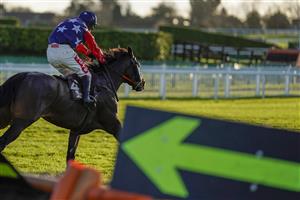 CHELTENHAM, ENGLAND - DECEMBER 12: Richard Johnson riding Make Good bypass the last hurdle (low sun) to win The Albert Bartlett Novices' Hurdle at Cheltenham Racecourse on December 12, 2020 in Cheltenham, England. Owners and a limited number of the public are allowed to attend the meeting due to the Coronavirus pandemic. (Photo by Alan Crowhurst/Getty Images)