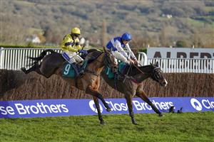 CHELTENHAM, ENGLAND - DECEMBER 12: Tom Scudamore riding Sky Pirate (yellow) clear the last to win The Spreadex Handicap Chase from Ibleo and Charlie Deutsch (R) at Cheltenham Racecourse on December 12, 2020 in Cheltenham, England. Owners and a limited number of the public are allowed to attend the meeting due to the Coronavirus pandemic. (Photo by Alan Crowhurst/Getty Images)