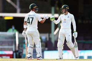 SYDNEY, AUSTRALIA - DECEMBER 13: Alex Carey and Ben McDermott of Australia A celebrate their half centuries during day three of the Tour Match between Australia A and India at Sydney Cricket Ground on December 13, 2020 in Sydney, Australia. (Photo by Brendon Thorne/Getty Images)