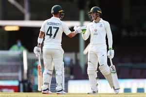 SYDNEY, AUSTRALIA - DECEMBER 13: Alex Carey and Ben McDermott of Australia A celebrate their half centuries during day three of the Tour Match between Australia A and India at Sydney Cricket Ground on December 13, 2020 in Sydney, Australia. (Photo by Brendon Thorne/Getty Images)
