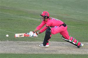 HOBART, AUSTRALIA - DECEMBER 13: Josh Philippe of the Sixers plays a reverse sweep shot during the Big Bash League match between the Sydney Sixers and the Melbourne Renegades at Blundstone Arena, on December 13, 2020, in Hobart, Australia. (Photo by Steve Bell/Getty Images)