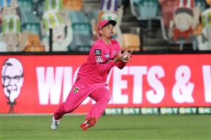 HOBART, AUSTRALIA - DECEMBER 13: Stephen O'Keefe of the Sixers
takes a catch to dismiss Sam Harper of the Renegades during the Big Bash League match between the Sydney Sixers and the Melbourne Renegades at Blundstone Arena, on December 13, 2020, in Hobart, Australia. (Photo by Matt King/Getty Images)