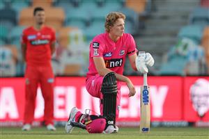 HOBART, AUSTRALIA - DECEMBER 13: Jack Edwards of the Sixers takes a knee during the Big Bash League match between the Sydney Sixers and the Melbourne Renegades at Blundstone Arena, on December 13, 2020, in Hobart, Australia. (Photo by Matt King/Getty Images)