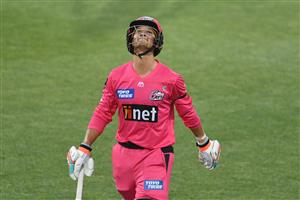 HOBART, AUSTRALIA - DECEMBER 13: Josh Philippe of the Sixers looks to the heavens after getting out for 95 during the Big Bash League match between the Sydney Sixers and the Melbourne Renegades at Blundstone Arena, on December 13, 2020, in Hobart, Australia. (Photo by Steve Bell/Getty Images)