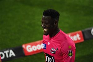 HOBART, AUSTRALIA - DECEMBER 13: Carlos Brathwaite of the Sixers all smiles after the game during the Big Bash League match between the Sydney Sixers and the Melbourne Renegades at Blundstone Arena, on December 13, 2020, in Hobart, Australia. (Photo by Steve Bell/Getty Images)
