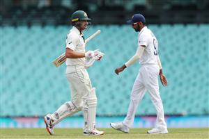 SYDNEY, AUSTRALIA - DECEMBER 13: Joe Burns of Australia A walks from the field after being dismissed by Mohammed Shami of India during day three of the Tour Match between Australia A and India at Sydney Cricket Ground on December 13, 2020 in Sydney, Australia. (Photo by Brendon Thorne/Getty Images)
