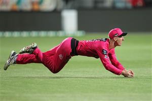 HOBART, AUSTRALIA - DECEMBER 13: Jordan Silk of the Sixers takes a catch to dismiss Benny Howell of the Renegades during the Big Bash League match between the Sydney Sixers and the Melbourne Renegades at Blundstone Arena, on December 13, 2020, in Hobart, Australia. (Photo by Matt King/Getty Images)