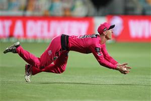 HOBART, AUSTRALIA - DECEMBER 13: Jordan Silk of the Sixers takes a catch to dismiss Benny Howell of the Renegades during the Big Bash League match between the Sydney Sixers and the Melbourne Renegades at Blundstone Arena, on December 13, 2020, in Hobart, Australia. (Photo by Matt King/Getty Images)