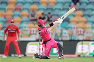 HOBART, AUSTRALIA - DECEMBER 13: Jordan Silk of the Sixers hits a six onto the roof during the Big Bash League match between the Sydney Sixers and the Melbourne Renegades at Blundstone Arena, on December 13, 2020, in Hobart, Australia. (Photo by Matt King/Getty Images)