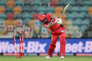 HOBART, AUSTRALIA - DECEMBER 13: Kane Richardson of the Renegades is bowled by Ben Dwarshuis of the Sixers during the Big Bash League match between the Sydney Sixers and the Melbourne Renegades at Blundstone Arena, on December 13, 2020, in Hobart, Australia. (Photo by Matt King/Getty Images)