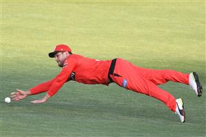 HOBART, AUSTRALIA - DECEMBER 13: Rilee Rossouw of the Renegades fields the ball during the Big Bash League match between the Sydney Sixers and the Melbourne Renegades at Blundstone Arena, on December 13, 2020, in Hobart, Australia. (Photo by Steve Bell/Getty Images)