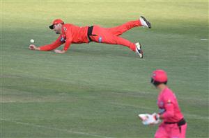 HOBART, AUSTRALIA - DECEMBER 13: Rilee Rossouw of the Renegades fields the ball during the Big Bash League match between the Sydney Sixers and the Melbourne Renegades at Blundstone Arena, on December 13, 2020, in Hobart, Australia. (Photo by Steve Bell/Getty Images)