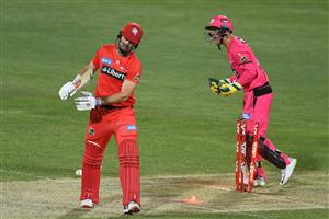 HOBART, AUSTRALIA - DECEMBER 13: Shaun Marsh of the Renegades is bowled during the Big Bash League match between the Sydney Sixers and the Melbourne Renegades at Blundstone Arena, on December 13, 2020, in Hobart, Australia. (Photo by Steve Bell/Getty Images)