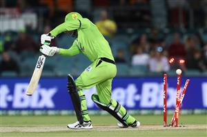 CANBERRA, AUSTRALIA - DECEMBER 14: Alex Hales of the Thunder is bowled by Jack Wildermuth of the Heat during the Big Bash League match between the Sydney Thunder and the Brisbane Heat at Manuka Oval, on December 14, 2020, in Canberra, Australia. (Photo by Brendon Thorne/Getty Images)