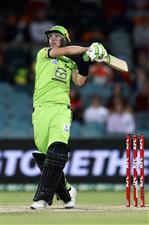 CANBERRA, AUSTRALIA - DECEMBER 14: Baxter Holt of the Thunder
bats during the Big Bash League match between the Sydney Thunder and the Brisbane Heat at Manuka Oval, on December 14, 2020, in Canberra, Australia. (Photo by Brendon Thorne/Getty Images)