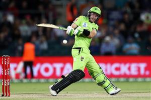 CANBERRA, AUSTRALIA - DECEMBER 14: Baxter Holt of the Thunder
bats during the Big Bash League match between the Sydney Thunder and the Brisbane Heat at Manuka Oval, on December 14, 2020, in Canberra, Australia. (Photo by Brendon Thorne/Getty Images)
