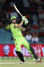 CANBERRA, AUSTRALIA - DECEMBER 14: Baxter Holt of the Thunder
bats during the Big Bash League match between the Sydney Thunder and the Brisbane Heat at Manuka Oval, on December 14, 2020, in Canberra, Australia. (Photo by Brendon Thorne/Getty Images)