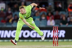CANBERRA, AUSTRALIA - DECEMBER 14: Nathan McAndrew of the Thunder bowls during the Big Bash League match between the Sydney Thunder and the Brisbane Heat at Manuka Oval, on December 14, 2020, in Canberra, Australia. (Photo by Brendon Thorne/Getty Images)