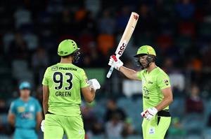 CANBERRA, AUSTRALIA - DECEMBER 14: Daniel Sams of the Thunder celebrates scoring his half century during the Big Bash League match between the Sydney Thunder and the Brisbane Heat at Manuka Oval, on December 14, 2020, in Canberra, Australia. (Photo by Brendon Thorne/Getty Images)