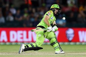 CANBERRA, AUSTRALIA - DECEMBER 14: Baxter Holt of the Thunder
bats during the Big Bash League match between the Sydney Thunder and the Brisbane Heat at Manuka Oval, on December 14, 2020, in Canberra, Australia. (Photo by Brendon Thorne/Getty Images)