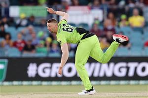 CANBERRA, AUSTRALIA - DECEMBER 14: Daniel Sams of the Thunder
bowls during the Big Bash League match between the Sydney Thunder and the Brisbane Heat at Manuka Oval, on December 14, 2020, in Canberra, Australia. (Photo by Brendon Thorne/Getty Images)