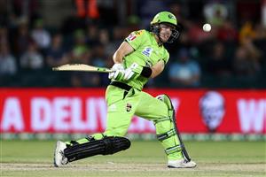 CANBERRA, AUSTRALIA - DECEMBER 14: Baxter Holt of the Thunder
bats during the Big Bash League match between the Sydney Thunder and the Brisbane Heat at Manuka Oval, on December 14, 2020, in Canberra, Australia. (Photo by Brendon Thorne/Getty Images)