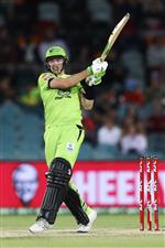 CANBERRA, AUSTRALIA - DECEMBER 14: Baxter Holt of the Thunder
bats during the Big Bash League match between the Sydney Thunder and the Brisbane Heat at Manuka Oval, on December 14, 2020, in Canberra, Australia. (Photo by Brendon Thorne/Getty Images)