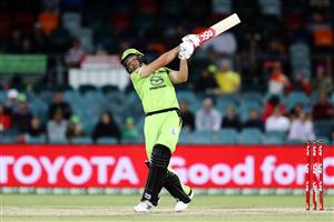 CANBERRA, AUSTRALIA - DECEMBER 14: Daniel Sams of the Thunder bats during the Big Bash League match between the Sydney Thunder and the Brisbane Heat at Manuka Oval, on December 14, 2020, in Canberra, Australia. (Photo by Brendon Thorne/Getty Images)