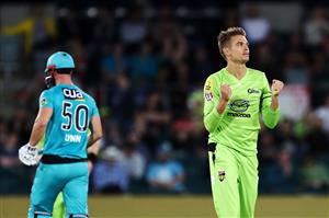 CANBERRA, AUSTRALIA - DECEMBER 14: Chris Green of the Thunder
celebrates after claiming the wicket of Chris Lynn of the Heat during the Big Bash League match between the Sydney Thunder and the Brisbane Heat at Manuka Oval, on December 14, 2020, in Canberra, Australia. (Photo by Brendon Thorne/Getty Images)