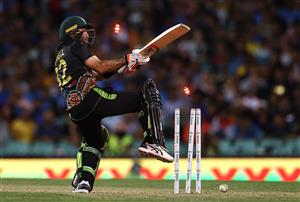 SYDNEY, AUSTRALIA - DECEMBER 08: Glenn Maxwell of Australia is bowled by Thangarasu Natarajan of India during game three of the Twenty20 International series between Australia and India at Sydney Cricket Ground on December 08, 2020 in Sydney, Australia. (Photo by Ryan Pierse/Getty Images)