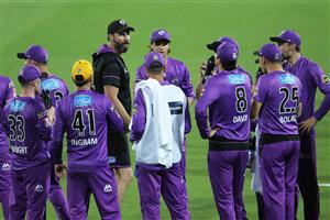 LAUNCESTON, AUSTRALIA - DECEMBER 15: Hurricanes head coach Adam Griffith speaks to players in a huddle in the break during the Big Bash League match between Hobart Hurricanes and Adelaide Strikers at University of Tasmania Stadium, on December 15, 2020, in Launceston, Australia. (Photo by Matt King/Getty Images)