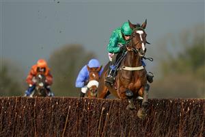 WINCANTON, ENGLAND - DECEMBER 15: Daryl Jacob riding Messire des Obeaux clear the last to win The Like Racing TV On Facebook Novices' Limited Handicap Chase at Wincanton Racecourse on December 15, 2020 in Wincanton, England. Owners and a limited number of the public are allowed to attend the meeting due to the Coronavirus pandemic. (Photo by Alan Crowhurst/Getty Images)