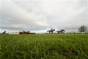 WINCANTON, ENGLAND - DECEMBER 15: Stan Sheppard riding Kestrel Valley (R) clear the last to win The Racing TV HD On Sky 426 Mares' Handicap Hurdle on December 15, 2020 in Wincanton, England. Owners and a limited number of the public are allowed to attend the meeting due to the Coronavirus pandemic. (Photo by Alan Crowhurst/Getty Images)